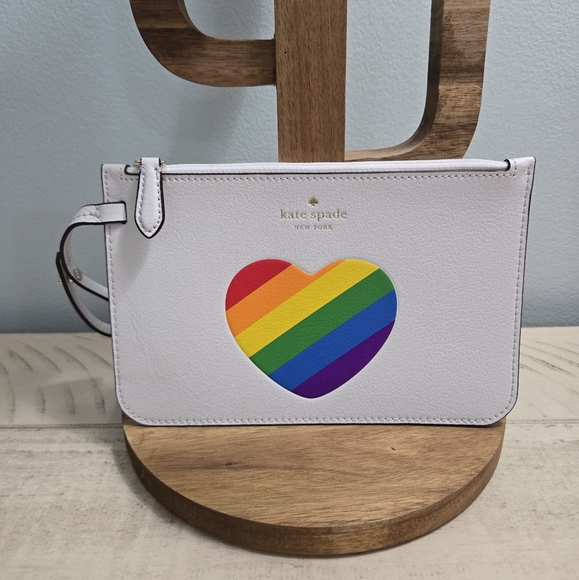 kate spade Handbags - Kate Spade New York White Pebble Leather Rainbow Skinny Wristlet/Clutch NWOT